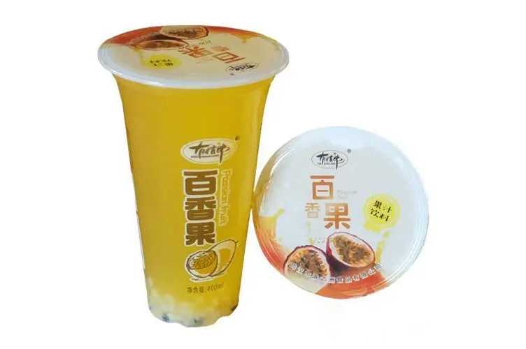 全自動杯裝果汁飲料灌裝封口機(jī)：開啟果汁新風(fēng)尚